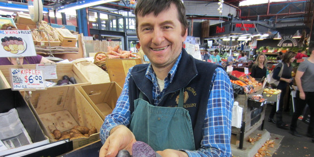Gourmet potato specialist Michael Mow shows off his wares at the Prahran market.
