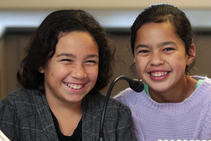 Gabriel and Tiare, 10, pray on Friday. Photo / Doug Sherring