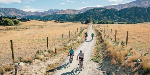 Hayden Donnell and friends ride the Queenstown cycle trail. Photo / Jim Pollard