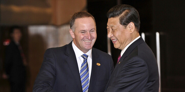 Prime Minister John Key with Chinese Premier President Xi Jinping. China has been clear the special relationship status New Zealand enjoys comes with obligations. Photo / Supplied