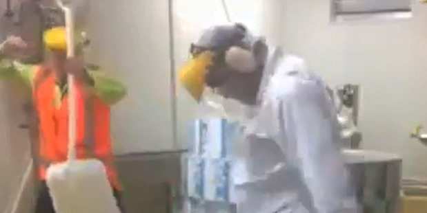 The men and other employees re-enacted their version of the Harlem Shake at Fonterra's Takanini plant. Image / YouTube