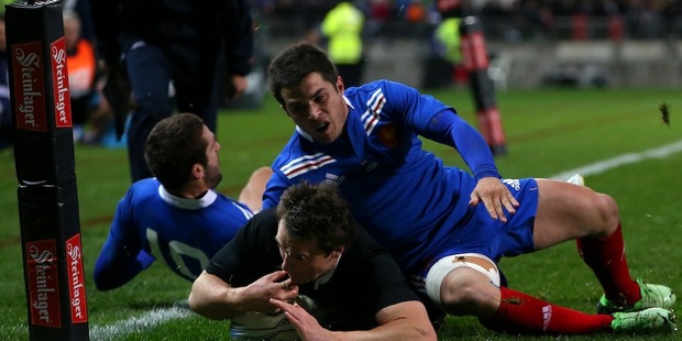 Ben Smith crosses over for All Blacks. Photo / Getty Images