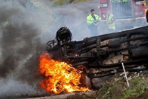 The stolen ute rolled and caught fire near Mamaku. Photo / Stephen Parker