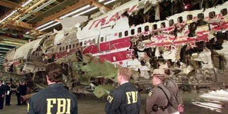 FBI agents and New York state police guard the reconstruction of TWA Flight 800 in Calverton. Photo / AP