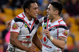 Glen Fisiiahi (L) of the Warriors celebrates with Shaun Johnson. Photo / Getty Images.