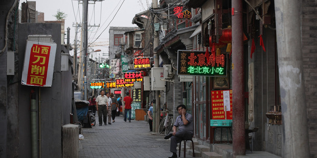 Beijing's back streets, like these, have stood since the Ming Dynasty. Photo / Getty Images