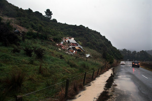 Relentless rain caused a 200m-long landslide at Kaiteriteri, demolishing a house and killing a 63-year-old woman yesterday. Photo / Tim Cuff