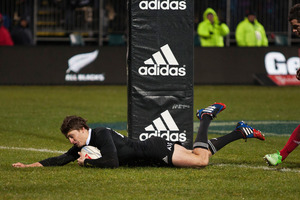 Taranaki's Beauden Barrett scores the second of the All Blacks' outstanding tries in Christchurch on Saturday night. Photo / Getty Images