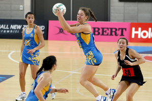Mt Albert Grammar captain Jamie-Lee Price (centre) her fellow defenders and mid-court ensured that the Tu Toa shooters were made to work hard for every goal. Photo / Mark Mitchell