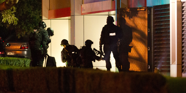 Armed police at the bottom of the Westpac building. Photo / Richard Robinson