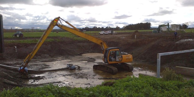 Dredging of effluent ponds has revealed no clues in the hunt for the murderer of farmer Scott Guy.