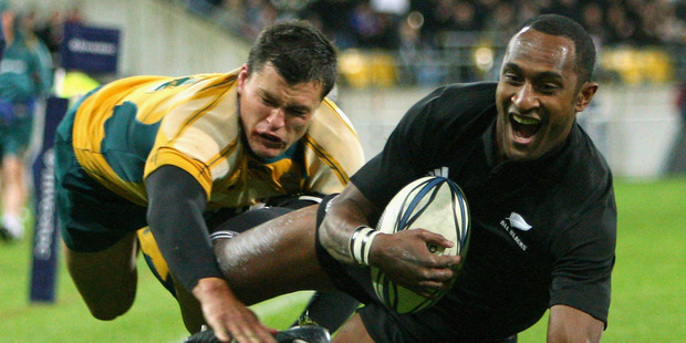 Joe Rokocoko scores against Australia in a 33-6 win in 2009 which marked the start of the current All Black era of domination. Photo / Getty Images