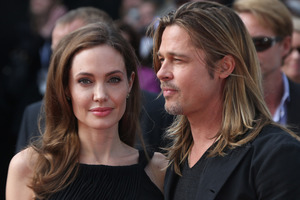 Angelina Jolie, pictured with partner Brad Pitt, chose to undergo a double mastectomy. Photo / AP