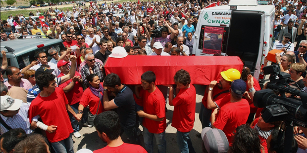 People carry the coffin of Ethem Sarisuluk, one of five people killed during the recent protests in Turkey. The country's Prime Minister says it was his 'duty' to crackdown on the protest. Photo / AP