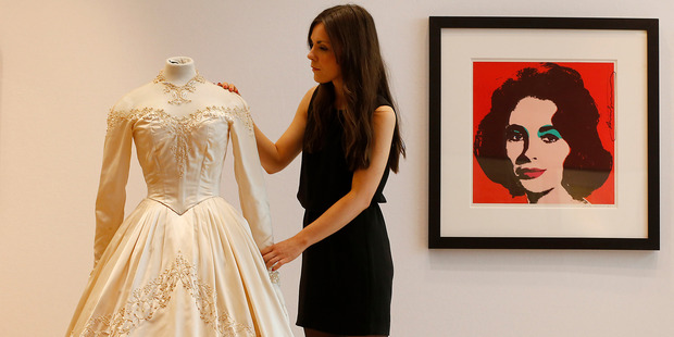 Elizabeth Taylor's first wedding dress, designed by the legendary costume designer Helen Rose is up for auction. Photo / AP