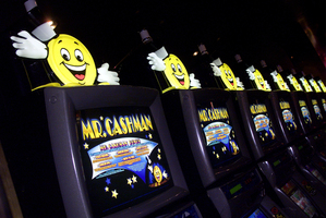 Instead of fewer pokies, poor communities are weighed down under more. Photo / Derek Flynn
