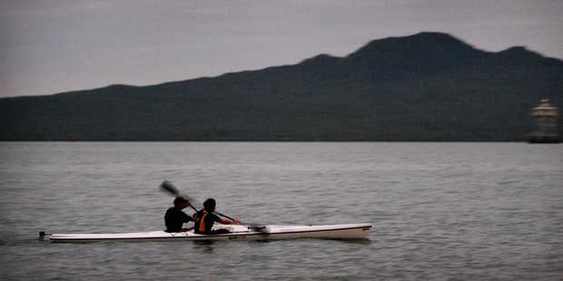 Kayakers make their way past the Tamaki Yacht Club. Photo / Greg Bowker