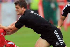 Scott Curry has been ruled out of the All Blacks Sevens squad for the World Cup next week after fracturing a bone in his right hand during training yesterday. Photo / Getty Images.