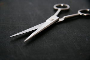 The woman was taken into a smoko room where she took a pair of scissors from a drawer and put them against her wrist. Photo / Thinkstock
