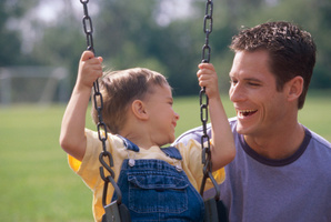 A young boy hears is father for the first time thanks to a microchip on his brain stem. Photo / Thinkstock