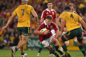 Tom Youngs of the Lions takes on Michael Hooper (L) and Kane Douglas during the First Test match between the Australian Wallabies and the British/Irish Lions. Photo / Getty Images