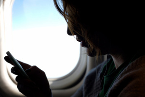 Is it really unsafe to use an mp3 player while flying? Photo / Thinkstock