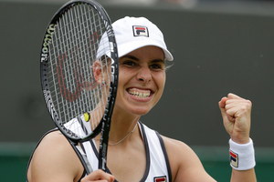 Marina Erakovic celebrates after beating Peng Shuai of China during their Women's second round singles match at the All England Lawn Tennis Championships in Wimbledon. Photo / AP