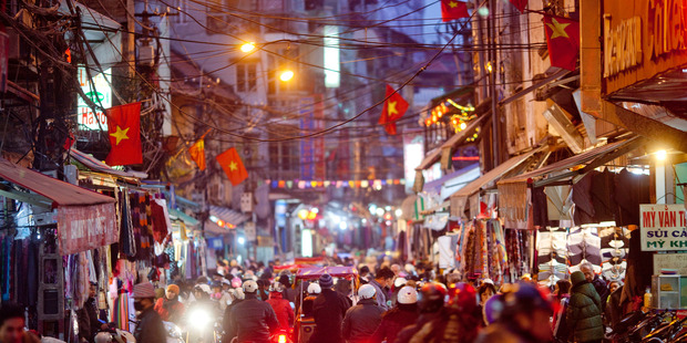 In Asia's party towns, such as Hanoi, female visitors can reduce unwanted attention by dressing modestly. Photo / Bloomberg