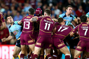 Blues and Maroons players fight during State of Origin game two. Photo / Getty Images