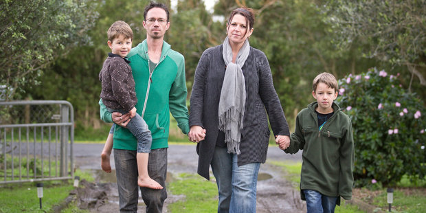 Robbie Ritchie with his wife Jacqui and two sons, William, 4, and Alex, 8. Photo / Greg Bowker