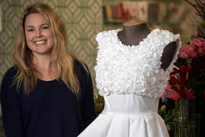 Kat McLeod with her dress made from toilet paper. Photo / Michael Craig