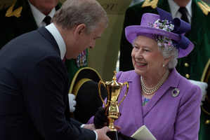 A wonderful moment for the Queen as her son Prince Andrew presents her with the Gold Cup after Estimate's win last Friday at Royal Ascot. Photo / AP