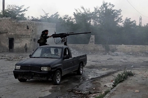 Bickering among rebel groups over weapons supplies has done nothing to further their cause. Photo / AP