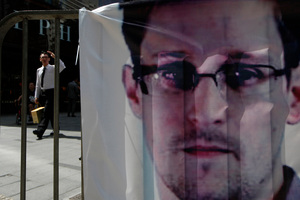 A banner supporting Edward Snowden, a former CIA employee who leaked top-secret documents about sweeping U.S. surveillance programs, is displayed in a Hong Kong shopping mall. Photo / AP