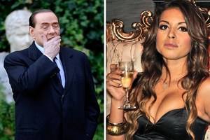 Ex-Italian Prime Minister Silvio Berlusconi (L) and Moroccan Karima El Mahroug, nicknamed Ruby the Heartstealer. The former premier has been sentenced to seven years in jail. Photo / AFP