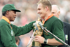 Nelson Mandela presents the William Webb Ellis Trophy to South African captain Francois Pienaar after the 1995 final. Photo / Dave Rogers /Allsport Nelson Mandela presents the William Webb Ellis Trophy to South African captain Francois Pienaar after the 1995 final. Photo / Dave Rogers /Allsport