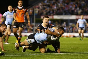 Jayson Bukuya of the Sharks scores. Photo / Getty Images