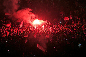 Opponents of Egypt's Islamist leader Mohammed Morsi celebrate outside the presidential palace in Cairo, Egypt. Photo / AP
