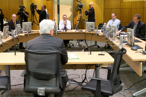 Dr Rodney Harrison, QC, makes his submission to Intelligence and Security select committee members, from left, Tony Ryall, John Key, David Shearer and Russel Norman. Photo / Mark Mitchell