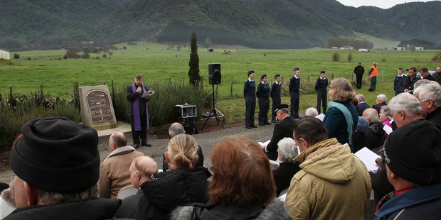 The memorial service was held below the site of the crash, on Old Te Aroha Rd, on the Matamata side of the Kaimai Range. Photo / Joel Ford