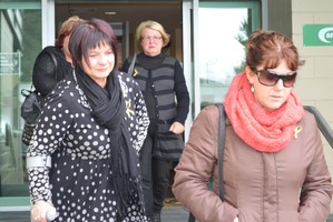 Anna Osborne (L), Cheryl Griffin (R) and Lynne Sims - who all lost loved ones in the mining disaster - leaving the Greymouth District Court after yesterday's sentencing. Photo / Greymouth Star