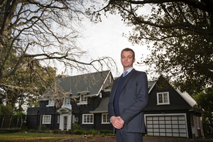 Mark Fraser of Hobsonville Land Company in front of Mill House. Photo / Greg Bowker