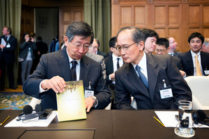 Japanese Deputy Minister of Foreign Affairs Koji Tsuruoka, left, and Ambassador of Japan to the Netherlands Yasumasa Nagamine at the hearing at The Hague. Photo / AP