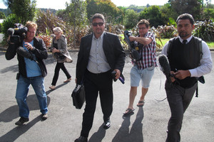 Commissioner Mike Eru arriving at Moerewa School last year, where media outnumbered protesters. Photo / APN