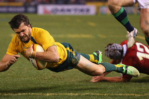 Adam Ashley-Cooper of the Wallabies scores a try during game two of the International Test Series between the Australian Wallabies and the British & Irish Lions. Photo / Getty Images.