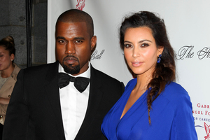 Kanye West, left, with his girlfriend Kim Kardashian. Photo/AP
