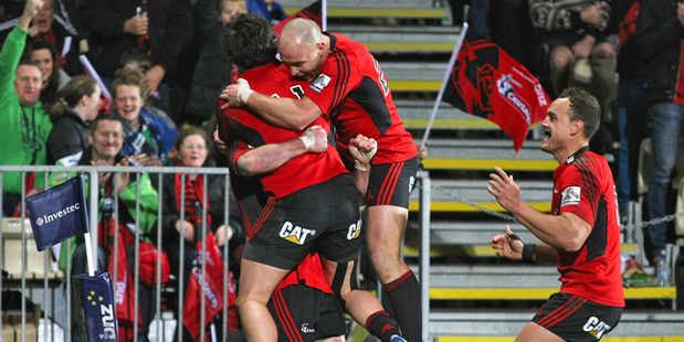 The Crusaders celebrate a try during their 43-15 win over the Chiefs. Photo / Getty Images