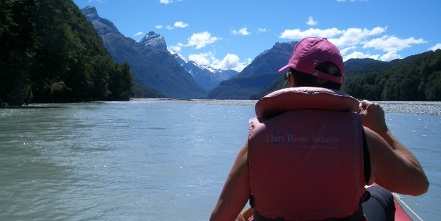 Justine Tyerman floats down the Dart River. Photo / Chris Tyerman