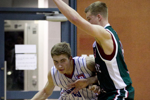 Westlake captain Jack Salt, seen here defending against Rangitoto's Sam Armitt, is on the radar of several colleges in the United States. Photo / Natalie Slade