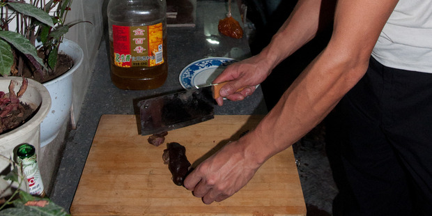 Dog penis is known in China as "strong part of dog" - and it is indeed strong, and tough to chop into equal-sized pieces. Photo / Heather Mosher